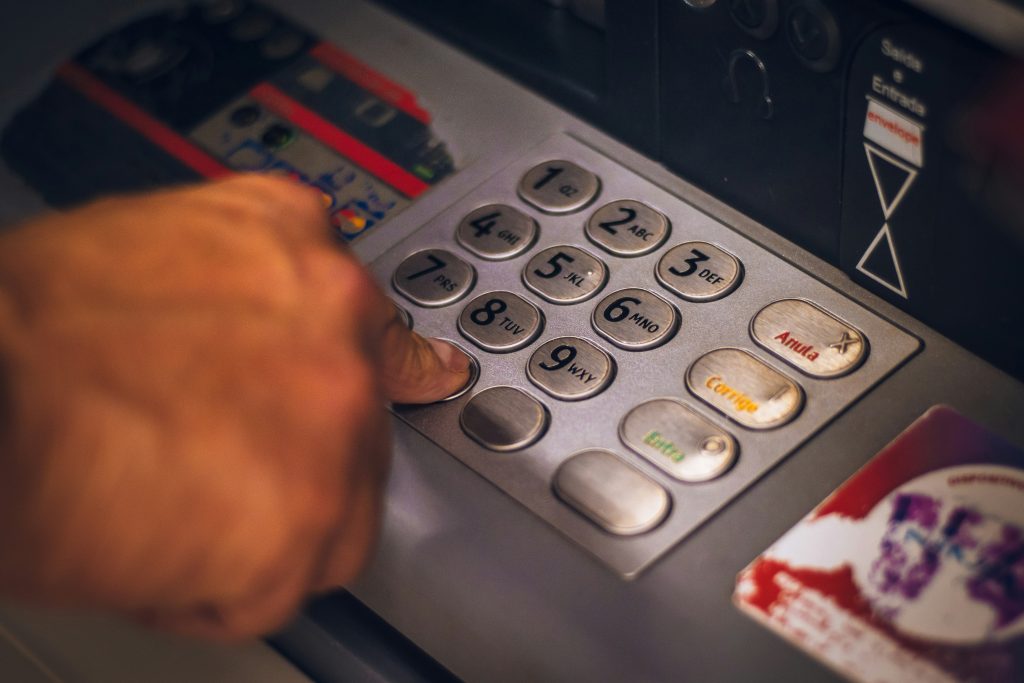 Punching numbers into an ATM